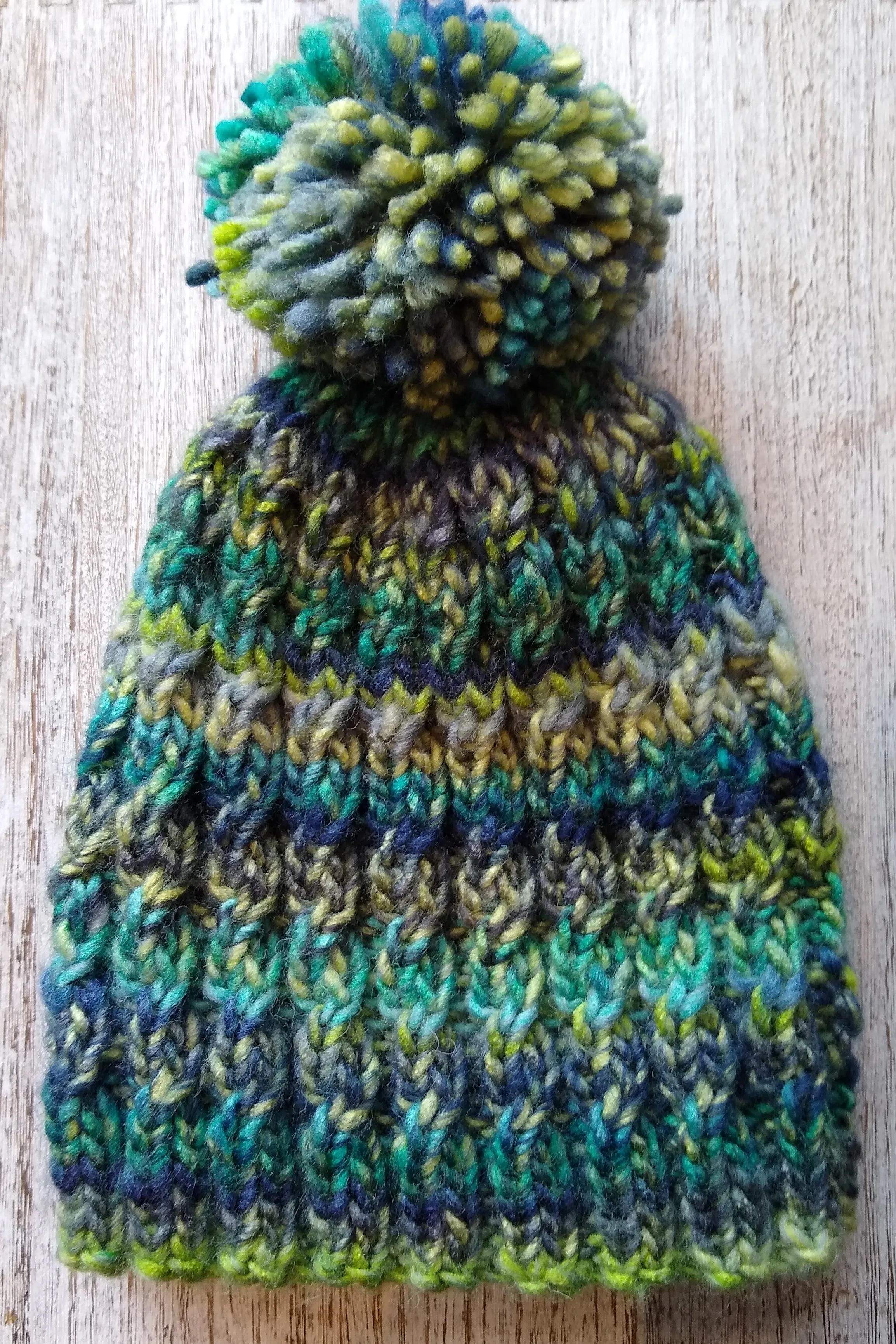 Knit a bobble hat in the round